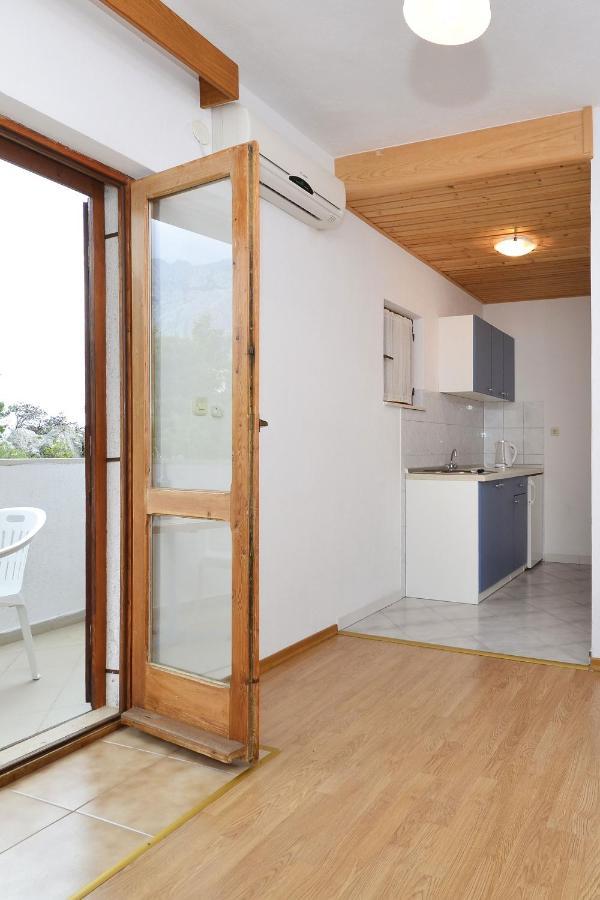 Family Friendly Apartments With A Swimming Pool Baska Voda, Makarska - 12442 Apartment